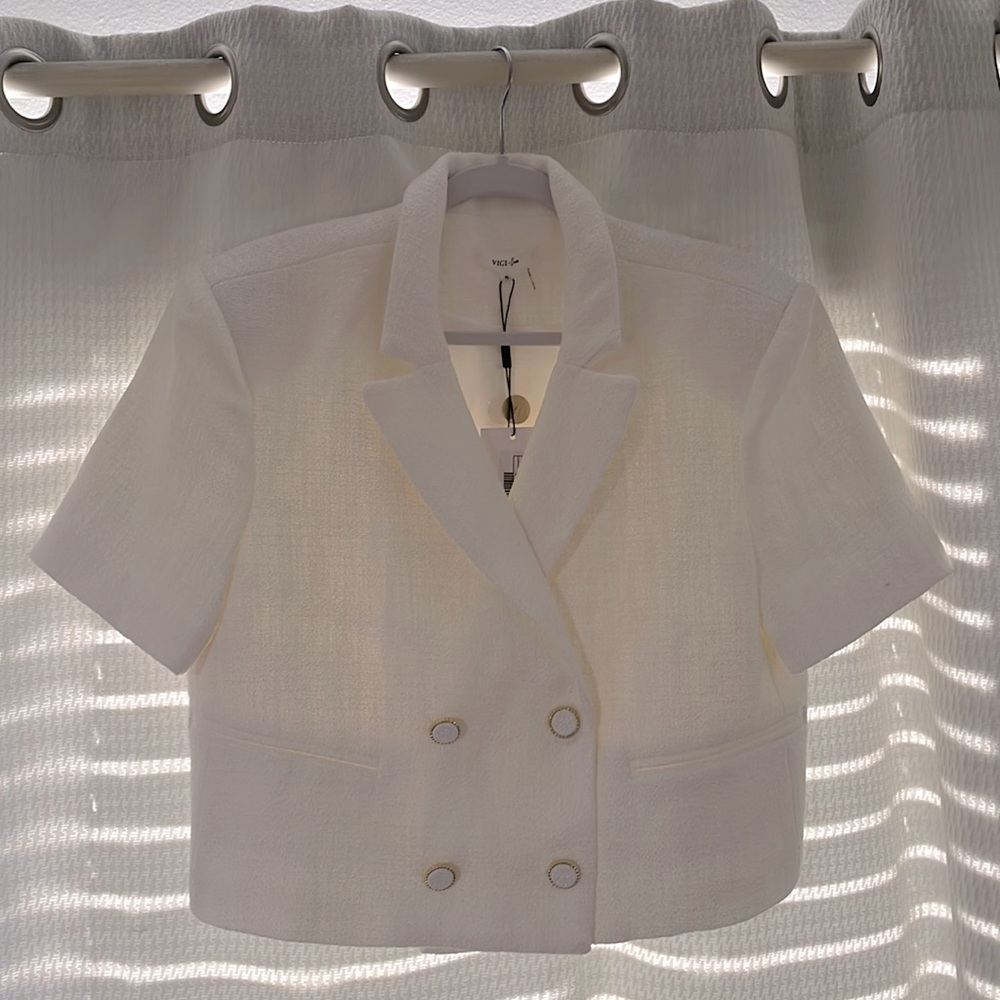 White, short sleeve, tweed top from Vici x Gina 2022.